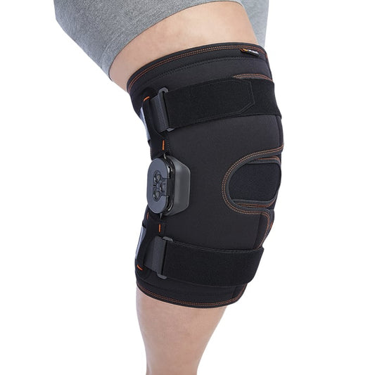 WRAPAROUND KNEE SUPPORT FEATURING JOINTS WITH FLEXION/EXTENSION CONTROL